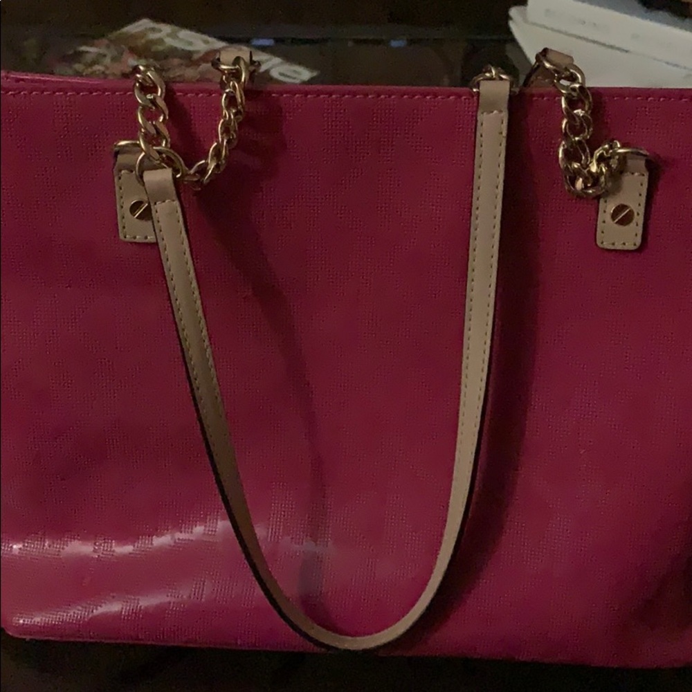 Pink Michael Kors bag.